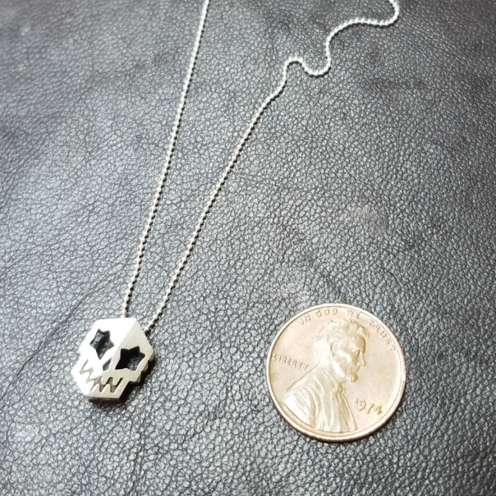 skull mask necklace